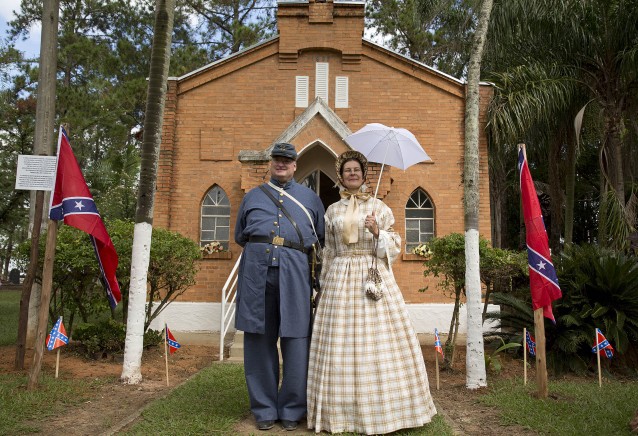 Descendants of American Southerners Philip Logan and his wife Eloiza Logan, pose for pictures during a party to celebrate the 150th anniversary of the end of the American Civil War in Santa Barbara d’Oeste, Brazil in April 2015. CREDIT: AP