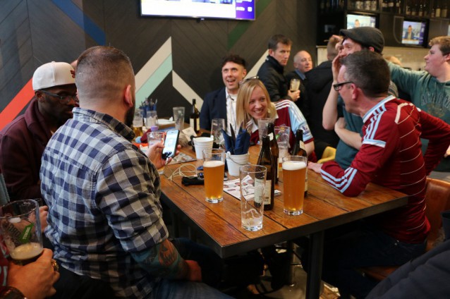 Members of Pride Of Irons at a celebration event after they launched in March. CREDIT: Travis Waldron