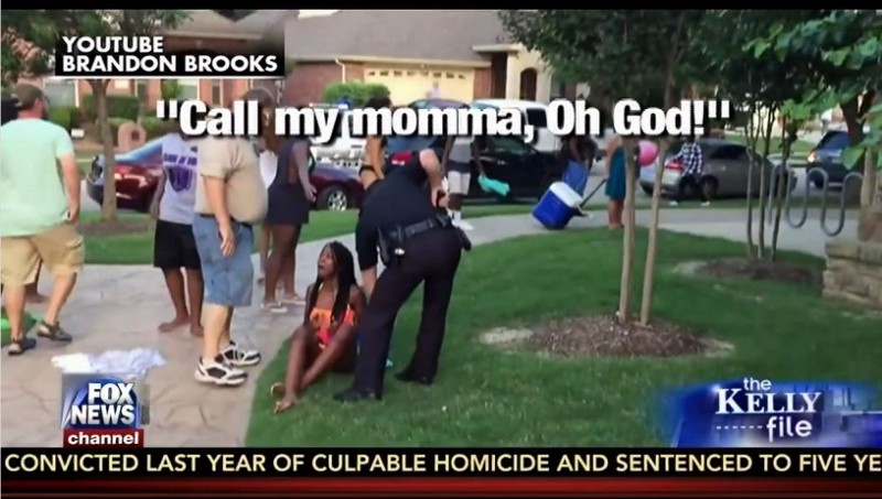 Police officer Cpl. Eric Casebolt wrestles a teenage girl to the ground. CREDIT: Screenshot/Fox News