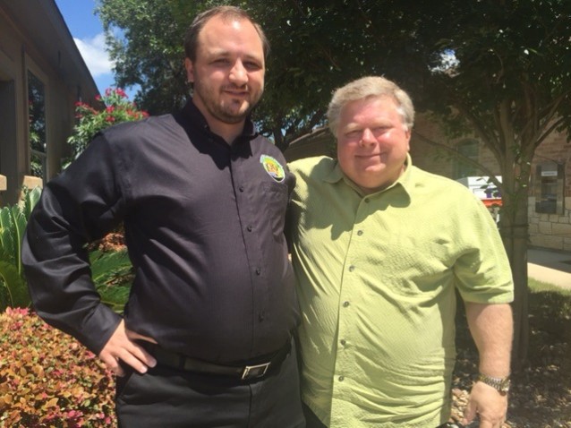 Chris Foster, Georgetown’s Resource Planning & Integration manager, and Dale Ross, mayor of Georgetown, outside of the Ross’s office in early June, 2015. CREDIT: ThinkProgress/Ari Phillips