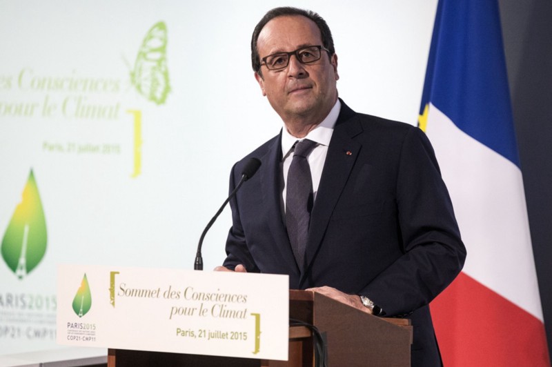 French President Francois Hollande delivers a speech during the opening of the Consciouness Summit in Paris, France, Tuesday, July 21, 2015. CREDIT: ETIENNE LAURENT/POOL PHOTO VIA AP