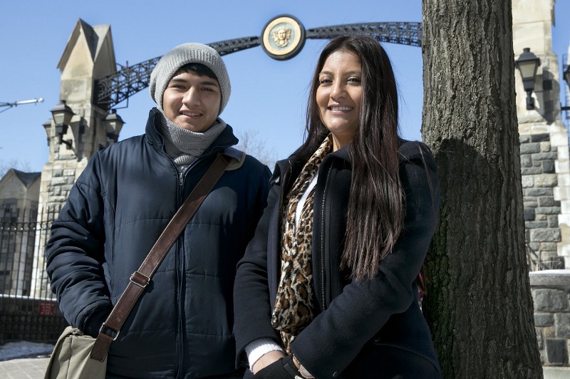 City University of New York students Freddy Vicuna, left, and Monica Sibri stand near the school’s Hudson Gate, in New York. Freddy participated in a hunger strike after the New York state government took out a provision allowing undocumented immigrant students to apply for financial aid, CREDIT: RICHARD DREW, AP