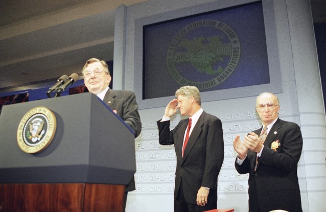 Lane Kirkland, left, introduces President Bill Clinton at the national convention of the AFL-CIO in San Francisco in 1993. CREDIT: AP Photo/Dennis Cook