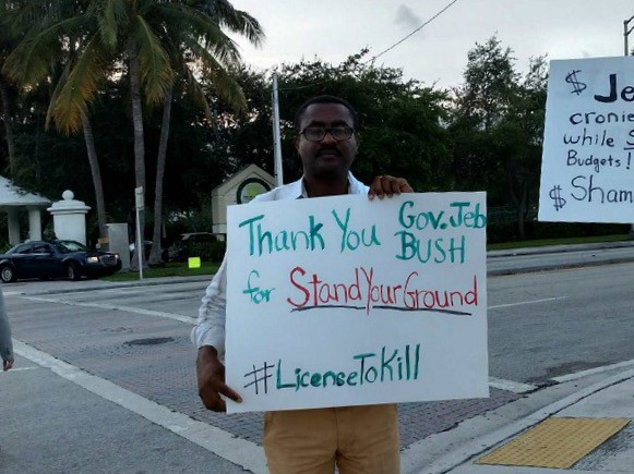 Floridians protest outside Jeb Bush’s speech to the Urban League. CREDIT: Jackie de Carvalho