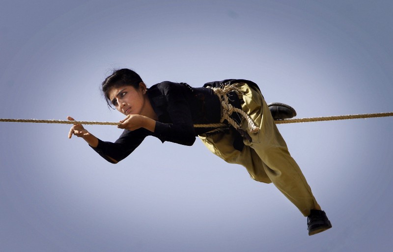 A Pakistani police commando participates in a training session in Karachi, Pakistan. In a country where women have traditionally not worked outside the home and widespread huge discrimination, the appointments represent a significant step for women’s empowerment. CREDIT: AP/SHAKIL ADIL