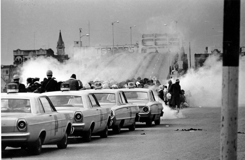 Alabama state troopers fire tear gas at civil rights marchers seeking the right to vote CREDIT: AP PHOTO/FILE