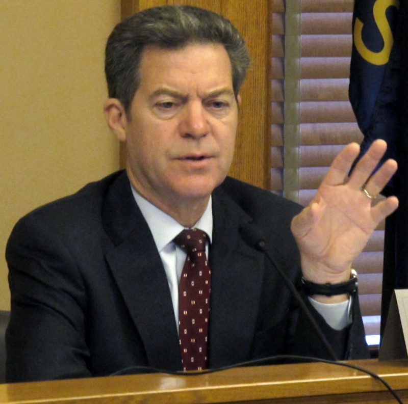 Kansas Gov. Sam Brownback (R) CREDIT: AP PHOTO/JOHN HANNA