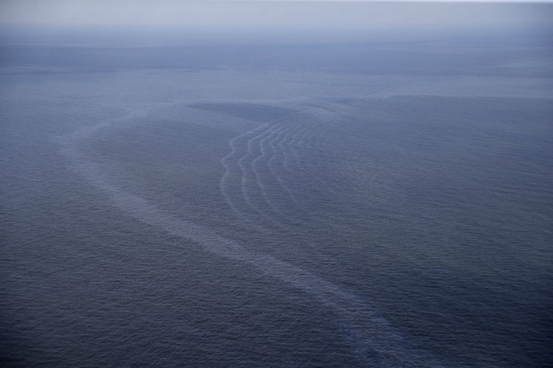 This March 31, 2015, aerial file photo, shows an oil sheen drifting from the site of the former Taylor Energy oil rig in the Gulf of Mexico, off the coast of Louisiana. CREDIT: AP PHOTO/GERALD HERBERT, FILE