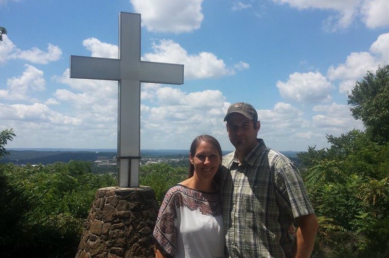 Melissa and Aaron Klein at the cross atop Mount Sequoyah, the highest point in Fayetteville. CREDIT: FACEBOOK/SWEET CAKES BY MELISSA