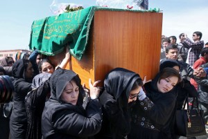 Afghan women rights activists carry the coffin of 27-year-old Farkhunda, an Afghan woman who was beaten to death by a mob. CREDIT: AP/Massoud Hossaini