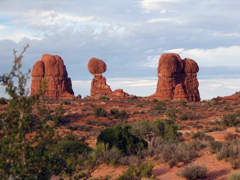 This Aug. 27, 2005 photo in Moab, Utah shows a sandstone formation in Arches National Park called Balanced Rock, center, that appears to sit atop a conical mass. CREDIT: AP PHOTO/BETH HARPAZ