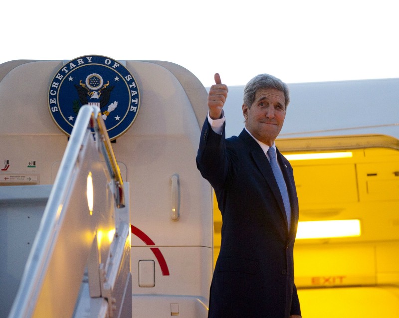U.S. Secretary of State John Kerry gives a thumbs-up as he boards his aircraft from Andrews Air Force Base, Md., for a flight to Havana, Friday, Aug. 14, 2015. CREDIT: AP PHOTO/PABLO MARTINEZ MONSIVAIS