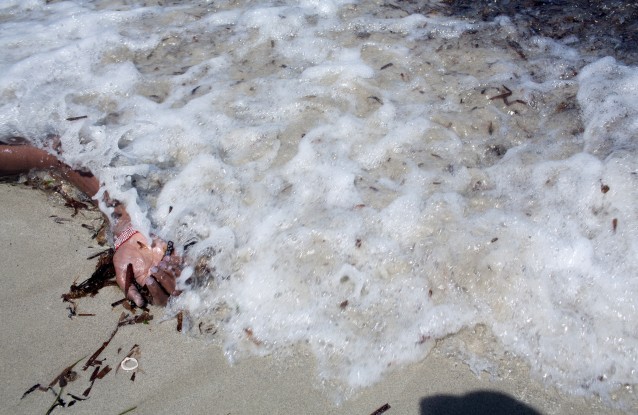 The arm of a dead migrant is seen at the waterfront of Zuwara, Libya. CREDIT: AP Photo/Mohamed Ben Khalifa
