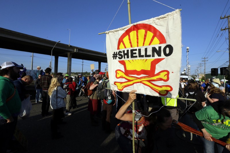 Protesters opposed to Arctic drilling rally at the Port of Seattle, Monday, May 18, 2015, in Seattle. CREDIT: AP PHOTO/TED S. WARREN