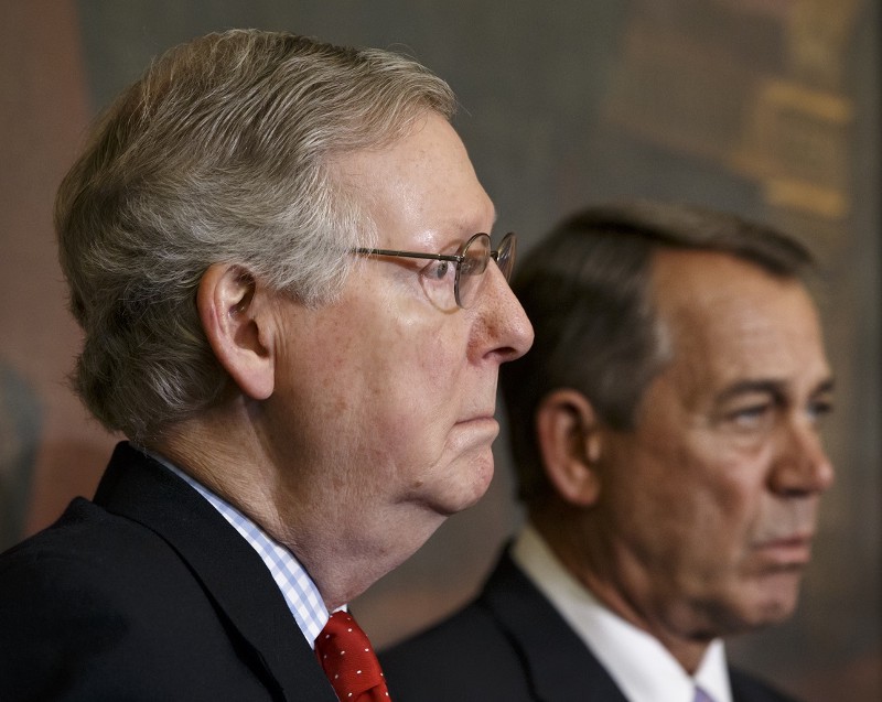 Senate Majority Leader Mitch McConnell, R-Ky., left, and Speaker of the House John Boehner, R-Ohio, stand together at a ceremony before the signing of the bill authorizing expansion of the Keystone XL pipeline, at the Capitol in Washington. The Republican party leaders strongly oppose President Obama’s Clean Power Plan, finalized today. CREDIT: (AP PHOTO/J. SCOTT APPLEWHITE