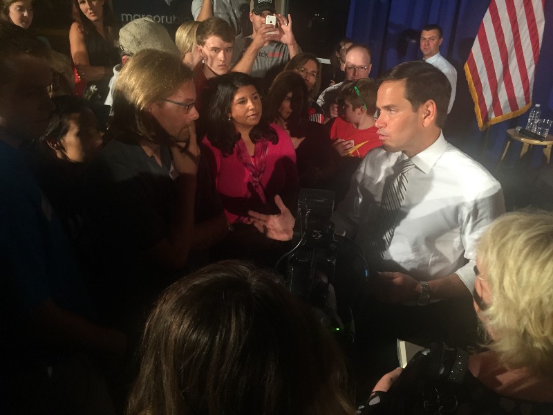 Republican presidential candidate Marco Rubio speaks with voters after a town hall in Davenport, Iowa on Sept. 24, 2015. CREDIT: EMILY ATKIN
