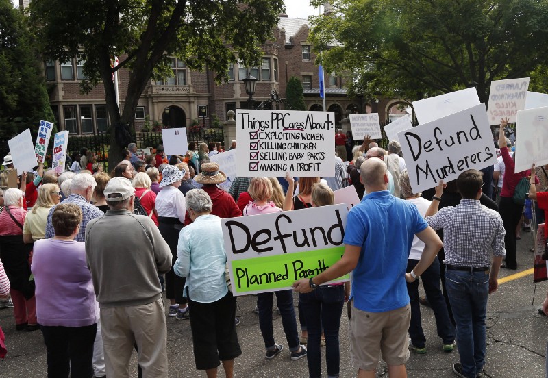 Hundreds of demonstrators call for defunding Planned Parenthood CREDIT: AP PHOTO/JIM MONE