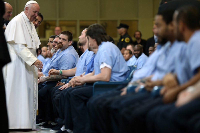 Pope Francis greets inmates during his visit to Curran Fromhold Correctional Facility in Philadelphia. CREDIT: DAVID MAIALETTI/THE PHILADELPHIA INQUIRER, POOL