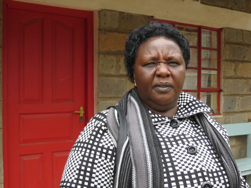 Agnes Pareyio stands in front of the Tasaru Girls Rescue Center which houses 46 girls who have escaped from FGM and early marriage. CREDIT: BEENISH AHMED