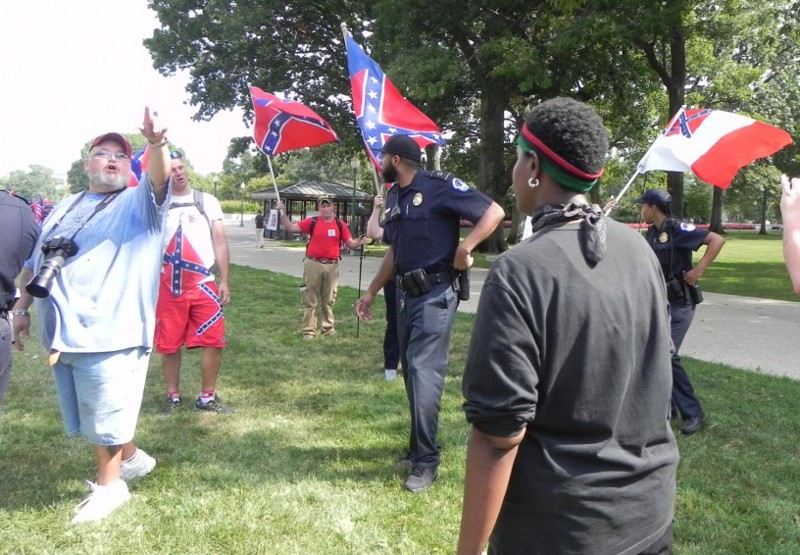 Ron Feathers gets into a shouting match with a Black Lives Matter demonstrator. CREDIT: Alice Ollstein
