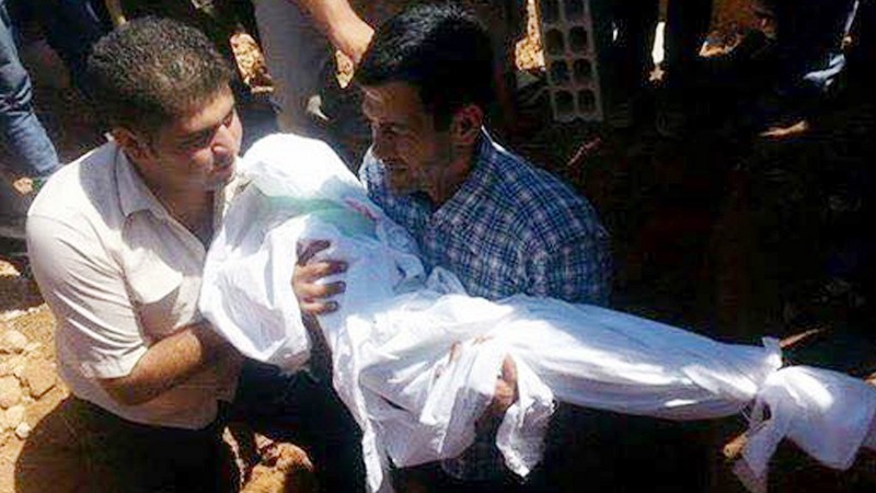 The burial of the 3-year-old drowned migrant, Alan Kurdi CREDIT: AP, SIPAN IBRAHIM