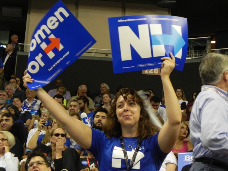 A young woman cheers Hillary Clinton in Manchester, New Hampshire. CREDIT: Alice Ollstein