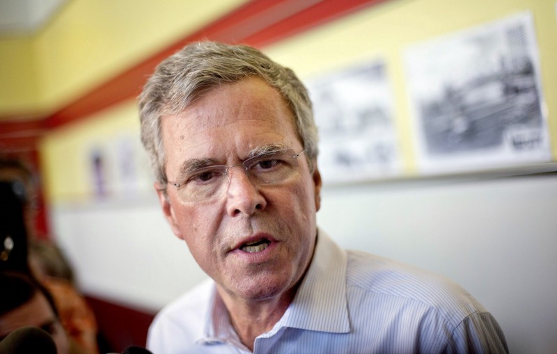 Republican presidential candidate, former Florida Gov. Jeb Bush talks to reporters at The Varsity restaurant during a campaign stop Tuesday, Aug. 18, 2015, in Atlanta. CREDIT: AP PHOTO/DAVID GOLDMAN