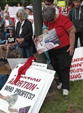 September protest against Planned Parenthood in St. Paul, MN CREDIT: AP Photo/Jim Mone