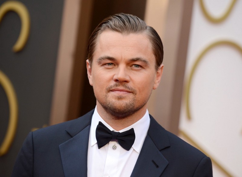 Actor Leonardo DiCaprio announced Tuesday he and his foundation will divest from fossil fuels. CREDIT: PHOTO BY JORDAN STRAUSS/INVISION/AP, FILE