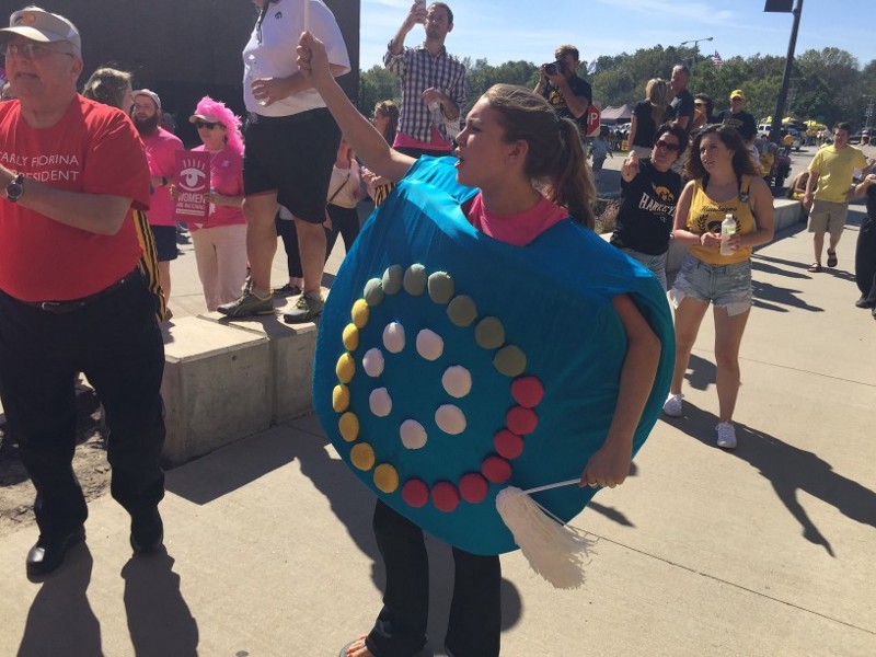 A Planned Parenthood supporter at the Carly Fiorina meet-and-greet in Iowa City on Saturday, dressed like a packet of birth control pills. CREDIT: Emily Atkin