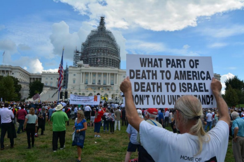 Protesters rally outside the U.S. Capitol, urging Congress not to the Iran deal. CREDIT: KIRA LERNER