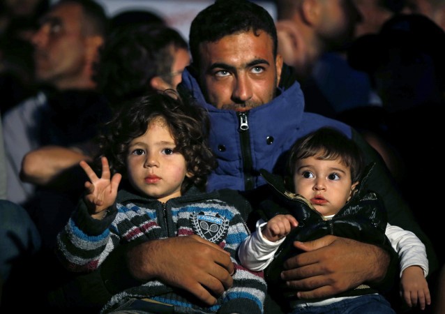 In this photo taken late Wednesday, Sept 16, 2015, migrants, trying to reach Europe demonstrate outside the Turkish city of Edirne, which borders European Union members Greece and Bulgaria. CREDIT: AP Photo/Emrah Gurel