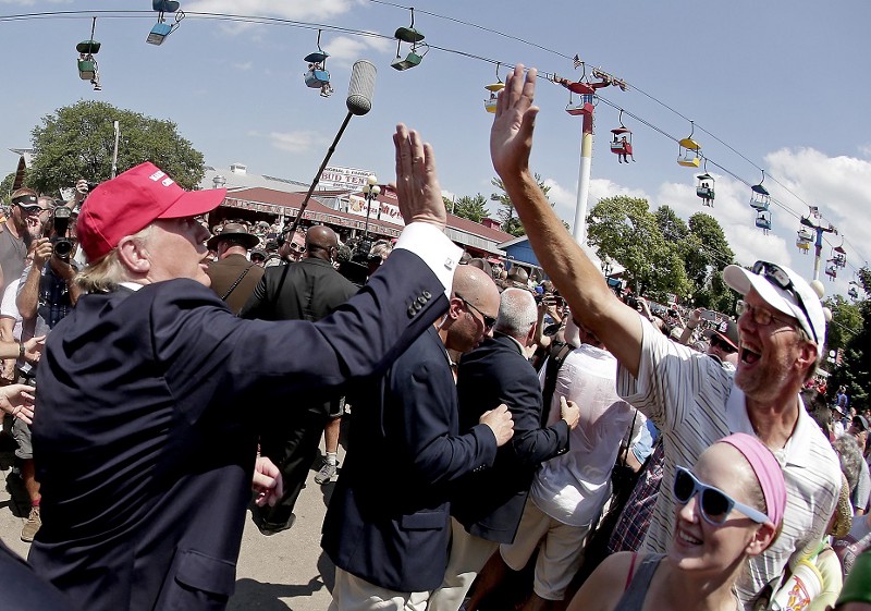 - In this Saturday, Aug. 15, 2015, file photo, Republican presidential candidate Donald Trump greets the crowd at the Iowa State Fair in Des Moines. Trump wants to deny citizenship to the babies of immigrants living in the U.S. illegally as part of an immigration plan that emphasizes border security and deportation for millions. CREDIT: AP PHOTO/CHARLIE RIEDEL