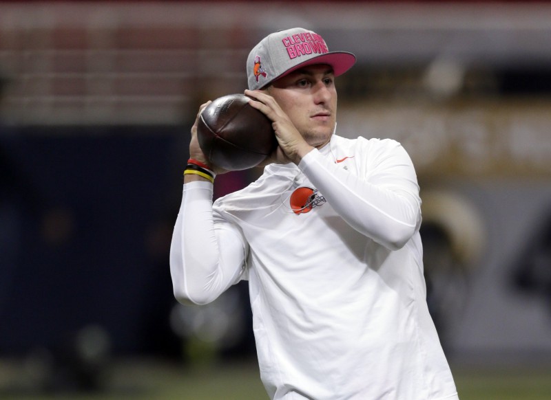 Cleveland Browns quarterback Johnny Manziel warms up before the start of an NFL football game between the St. Louis Rams and the Cleveland Browns Sunday, Oct. 25, 2015, in St. Louis. (AP Photo/Tom Gannam) CREDIT: TOM GANNAM, AP
