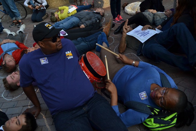 Protesters participating in a die-in in front of the American Petroleum Institute CREDIT: Jess Colarossi