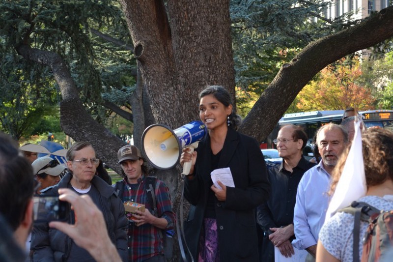 Keya Chatterjee, speaking to the crowd of protesters. CREDIT: Jess Colarossi