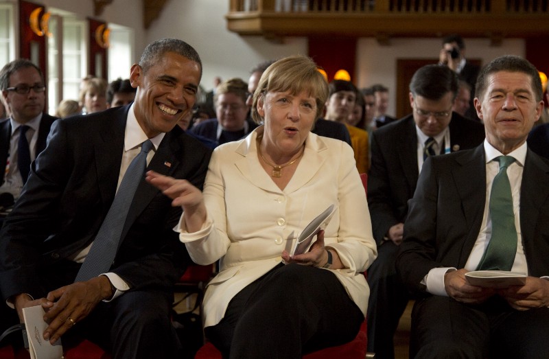 German Chancellor Angela Merkel, center, attends a concert with her husband Joachim Sauer, right, U.S. President Barack Obama and other leaders at the G-7 summit at Schloss Elmau hotel near Garmisch-Partenkirchen, southern Germany, Sunday, June 7, 2015. CREDIT: (AP PHOTO/VIRGINIA MAYO, POOL