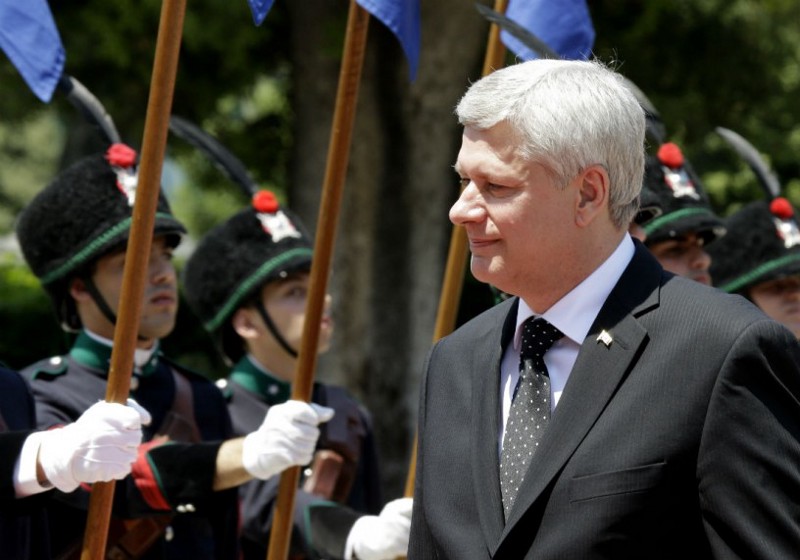Canada’s Prime Minister Stephen Harper reviews the honor guard prior the meeting with Italian Premier Matteo Renzi in Rome, Thursday, June 11, 2015. CREDIT: AP Photo/Andrew Medichini