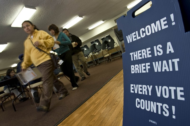 Latino voters leave their polling place, the First Unted Methodist Church, after voting in Santa Ana, Calif., Tuesday, Nov. 4, 2008. (AP Photo/Mark Avery) CREDIT: AP PHOTO/MARK AVERY
