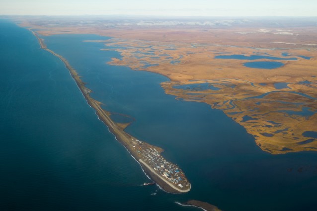 This aerial photo shows the island village of Kivalina, an Alaska Native community of 400 people already receding into the ocean as a result of rising sea levels. CREDIT: AP Photo/Andrew Harnik