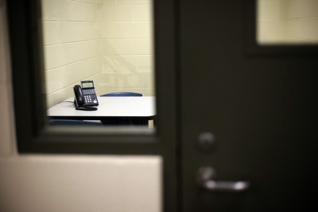 A phone sits on a table in a visitation room at the Karnes County Residential Center, Thursday, July 31, 2014, in Karnes City, Texas. CREDIT: AP Photo/Eric Gay