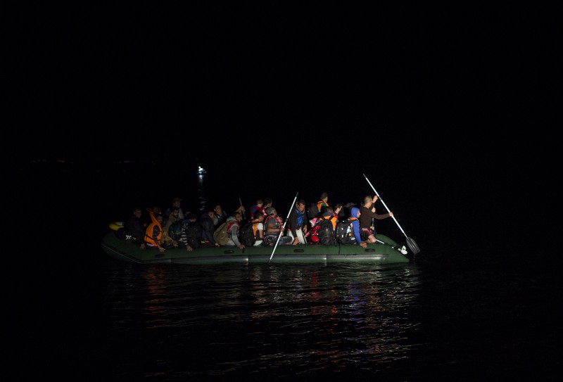 Migrants and refugees arrive on a dinghy from the Turkish coast to the northeastern Greek island of Lesbos, Monday, Oct. 19, 2015. CREDIT: AP PHOTO/SANTI PALACIOS