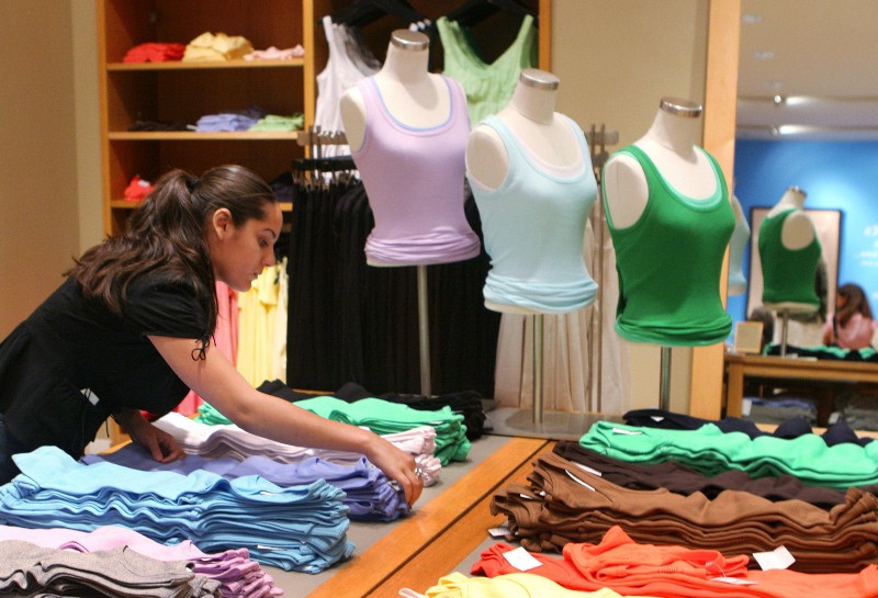 A J. Crew employee at a store in New York CREDIT: AP PHOTO/MARK LENNIHAN
