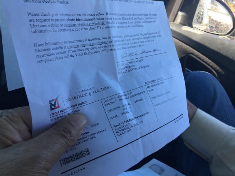 Wilbur Scott, whose name has been changed because his daughters do not know his history as a felon, holds the voter registration he recently received in the mail. Scott voted for the first time in decades on Tuesday, CREDIT: Emily Atkin