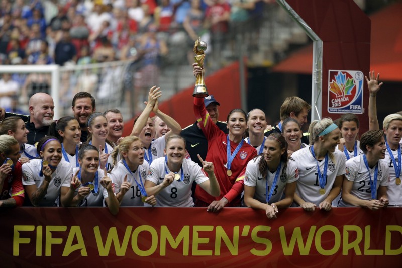 The U.S. Women’s National Team celebrates its World Cup victory. CREDIT: AP PHOTO/ELAINE THOMPSON