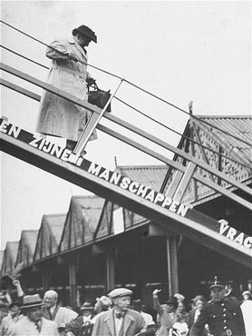 Else Wolff disembarks from the refugee ship MS St. Louis in Antwerp, Belgium along with her husband and daughter (not pictured). Her husband was later sent to a concentration camp in southern France.
