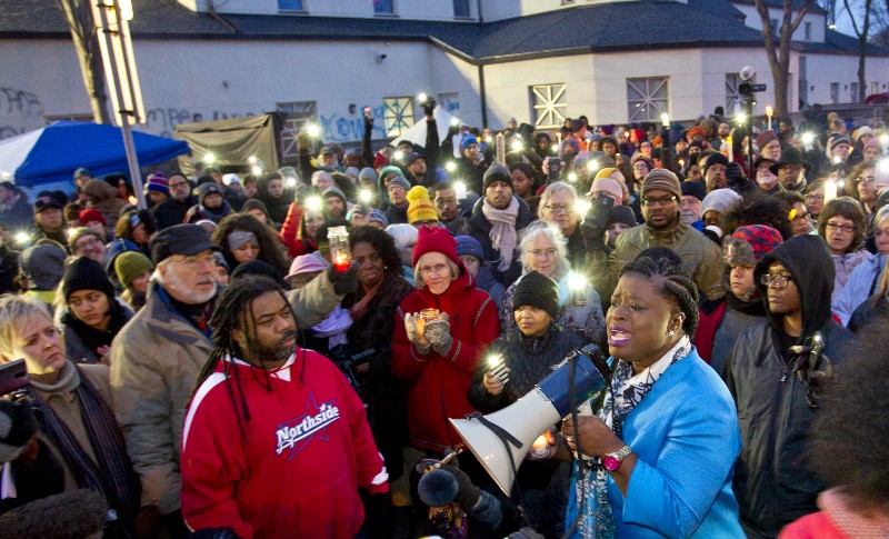 NAACP Minneapolis President Nekima Levy-Pounds speaks during a vigil in front of the Minneapolis Police Department’s fourth precinct Friday, Nov. 20, 2015, in Minneapolis. The vigil was held because of the fatal shooting of Jamar Clark by Minneapolis police on Sunday. CREDIT: AP PHOTO/ANDY CLAYTON-KING