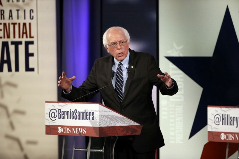 Bernie Sanders makes a point during a Democratic presidential primary debate, Saturday, Nov. 14, 2015, in Des Moines, Iowa. CREDIT: AP PHOTO/CHARLIE NEIBERGALL
