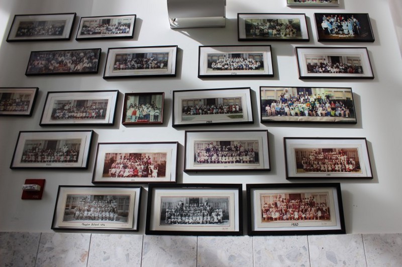 Graduating classes throughout the years at the James H. Naylor School. CREDIT: Casey Quinlan