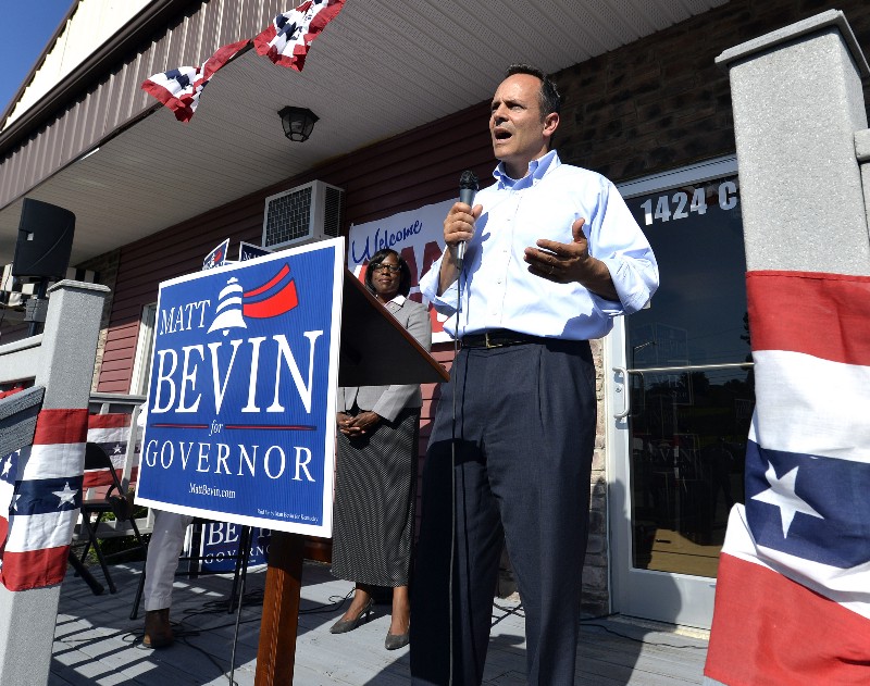 Kentucky Republican Gubernatorial candidate Matt Bevin, right, addresses his supporters as his running mate Jenean Hampton looks on from the steps of the Bevin campaign headquarters in Somerset Ky., Friday, Aug. 21, 2015. (AP Photo/Timothy D. Easley) CREDIT: AP PHOTO/TIMOTHY D. EASLEY